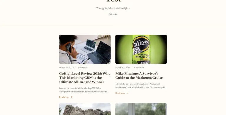 Public BlogBaser-hosted blog at mike-test.blogbaser.com in a warm serif theme showing 30 posts, with cards for 'GoHighLevel Review 2025' and 'Mike Filsaime: A Survivor's Guide to the Marketers Cruise'